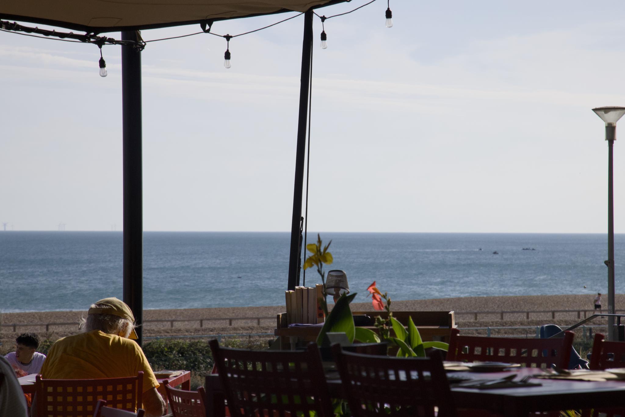 View over the shingle beach from a restaurant terrace