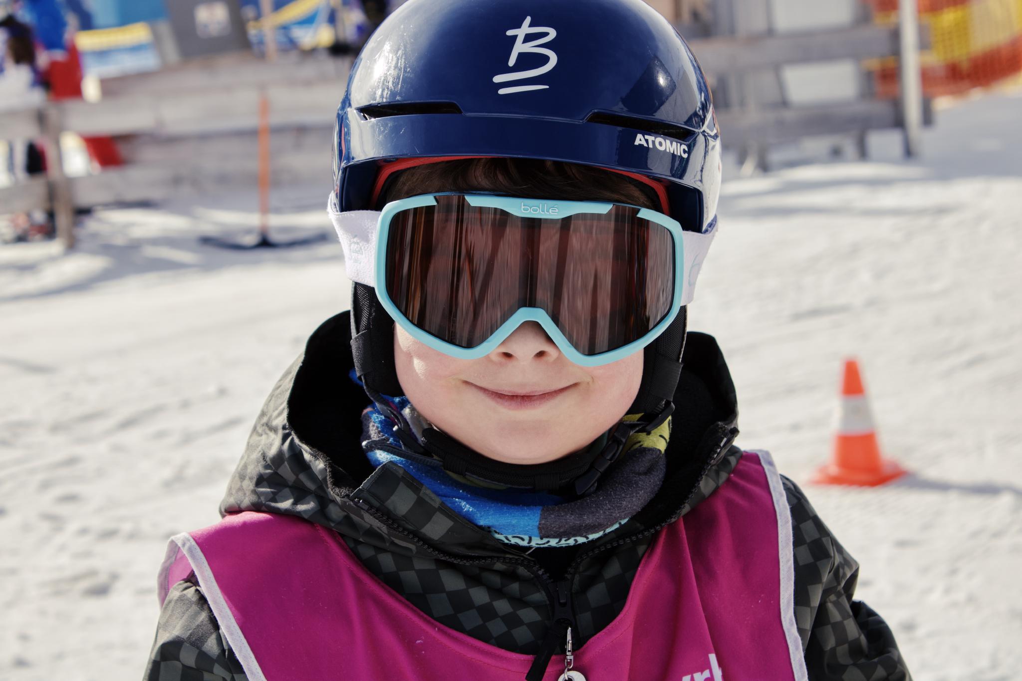 Tilian with helmet and ski goggles after the race